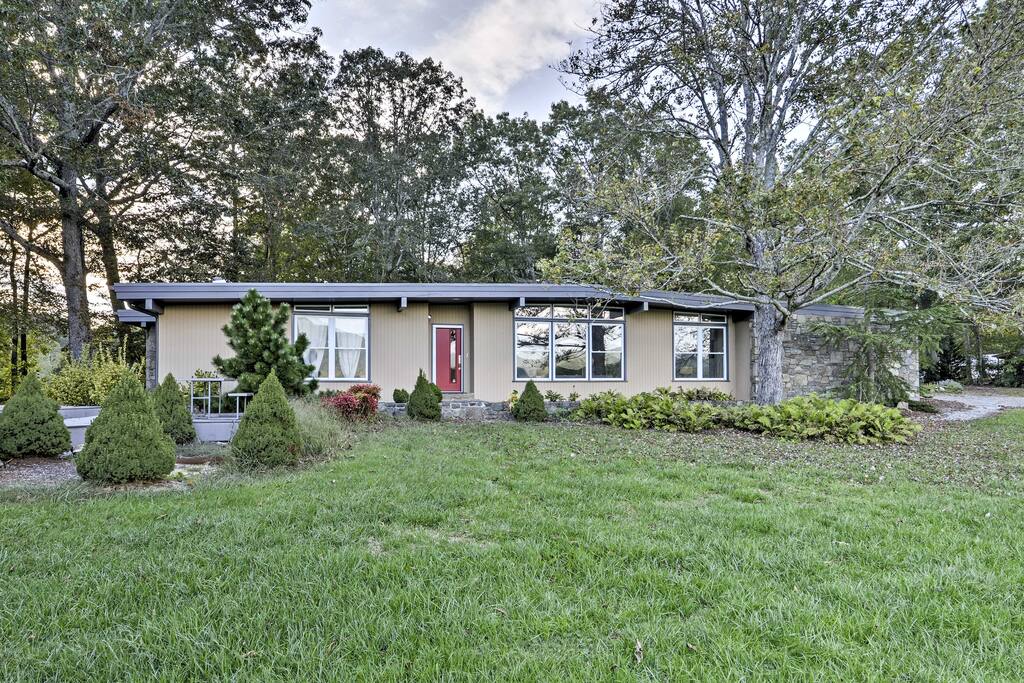 Embark on an unforgettable adventure in the Carolina mountainside at this 3+-bedroom, 3-bathroom Fairview vacation rental house that sleeps 12!