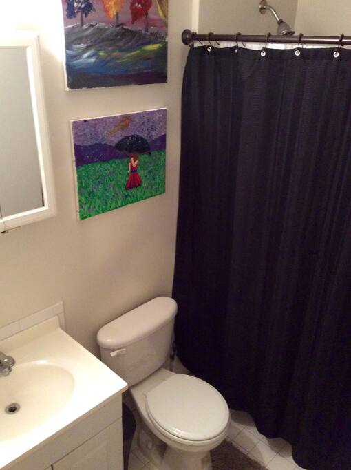 Bathroom with fresh towels provided, access to toiletries