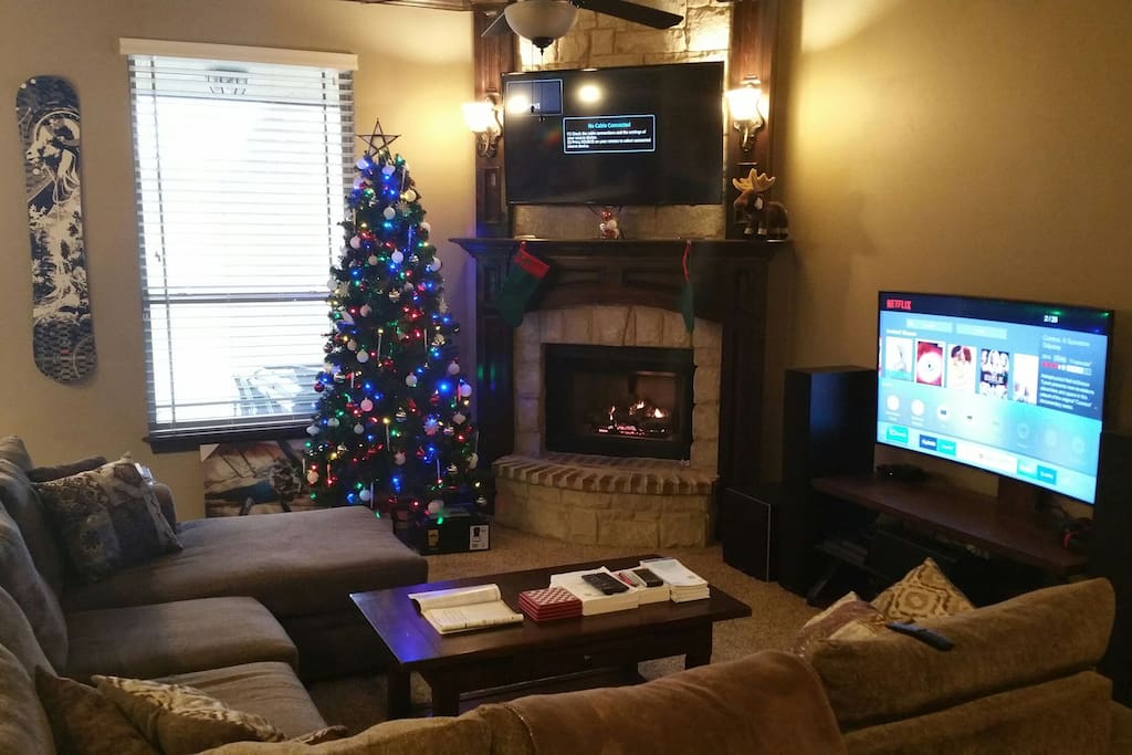 Living room with 2 TVs, 7.2.2 Atmos Surround Sound and Fireplace!