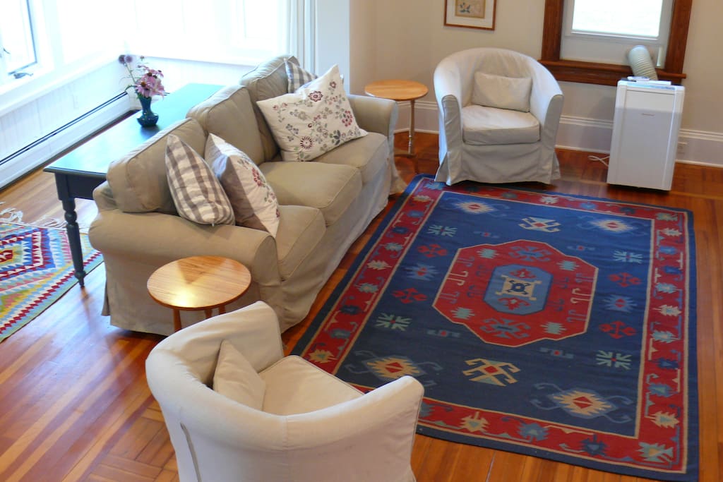 The spacious living room has great sunlight throughout the day but the curtains can be drawn for additional privacy. While there is a flat screen TV with cable, this is also a great space to pull out the board games provided or bring your own!