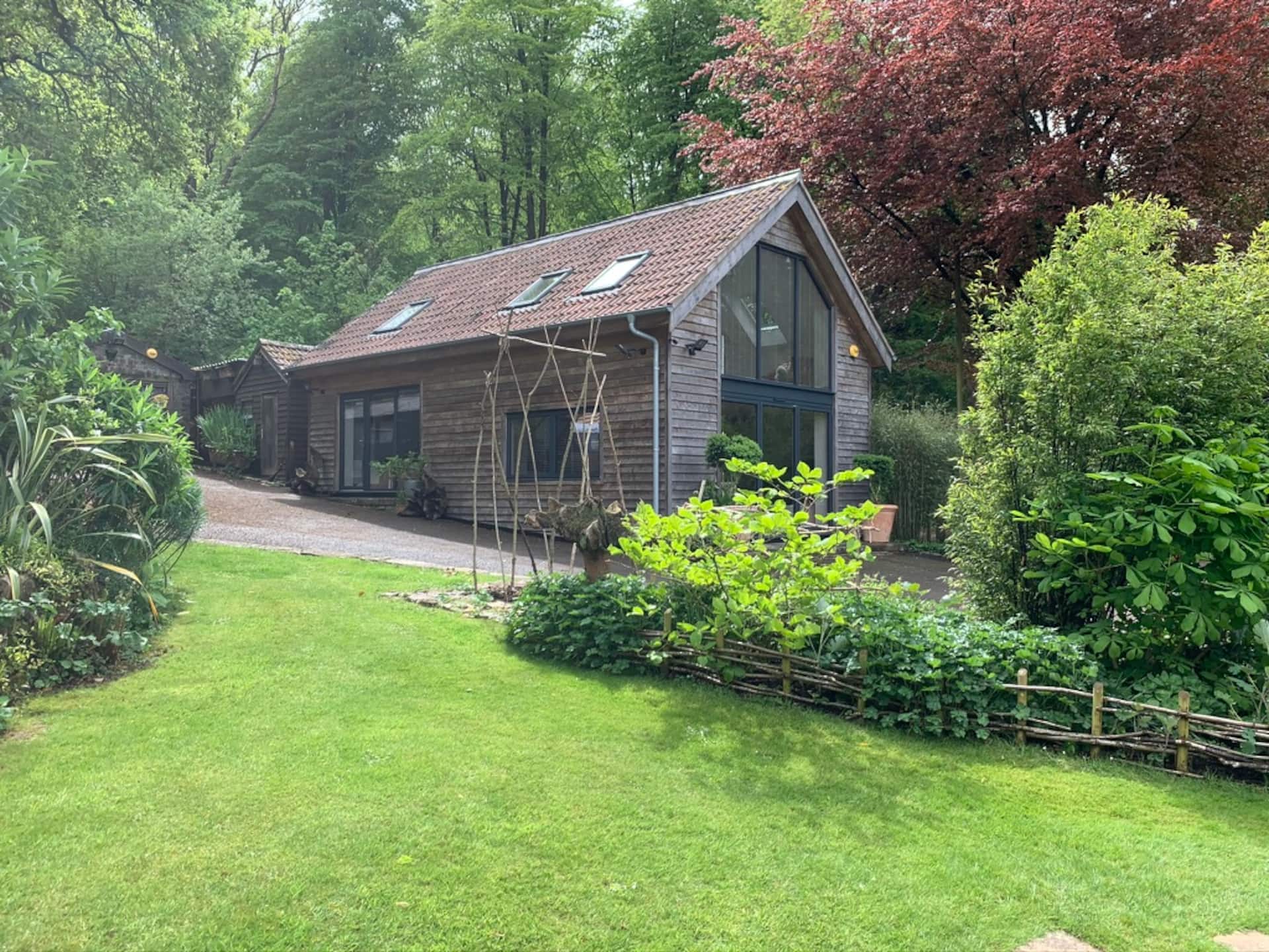 Woodside, surrounded by woodland and beautiful gardens