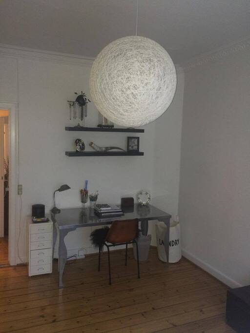 The bedroom, with a desk area
