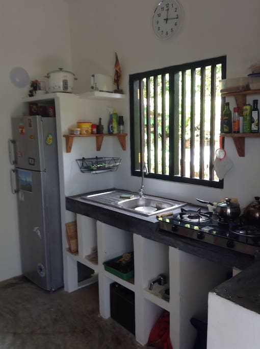 Kitchen with three burner hob.