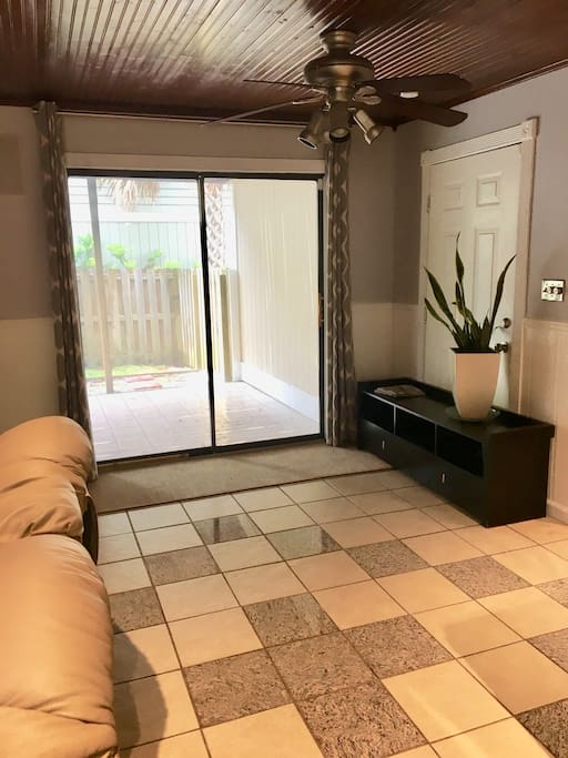 Private entry with an outdoor patio