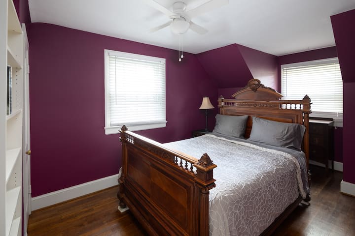 A dresser and a closet are provided.  The antique bed shown was replaced with a full-sized bed. The Queen was too big for the room.