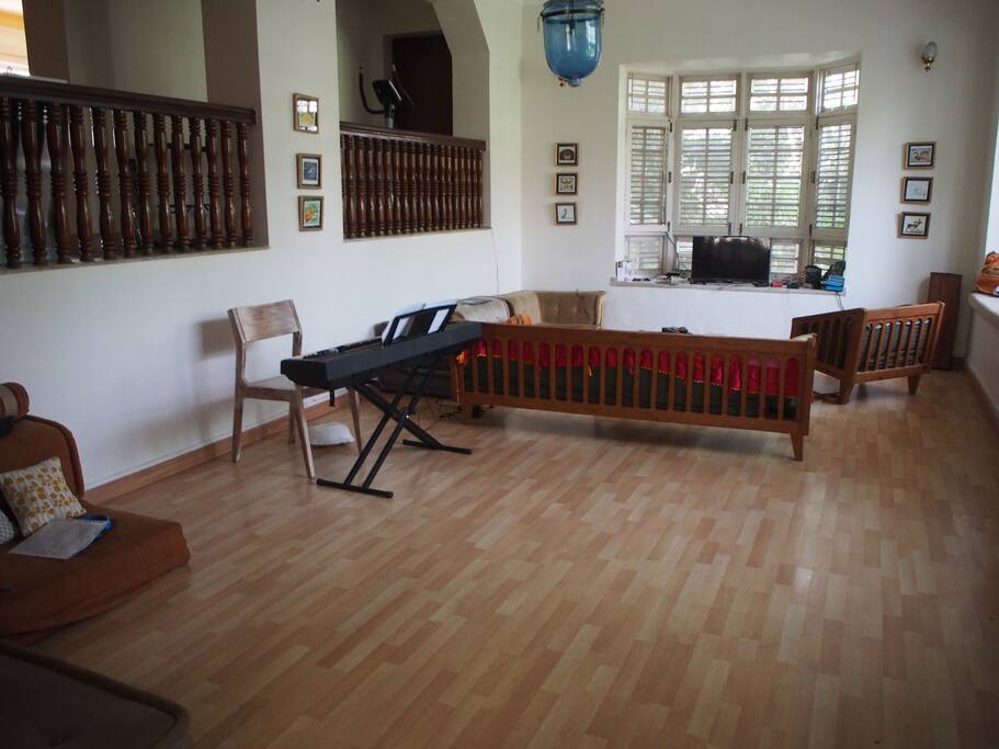 Huge living room with TV, cable and DVD player