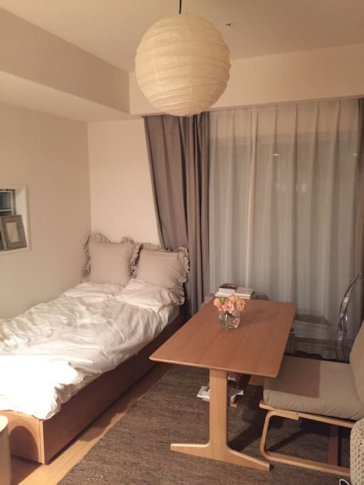 Single MUJI bed. MUJI table and MUJI sofa chair.. I love MUJI