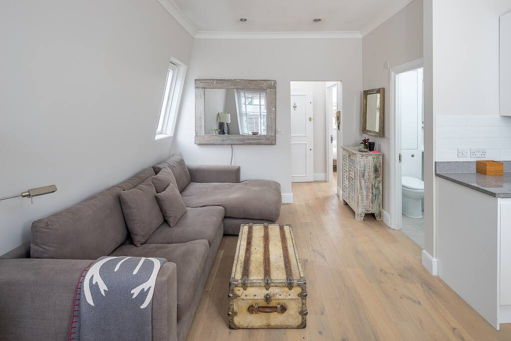 Fantastic light living area with lots of comfy seating