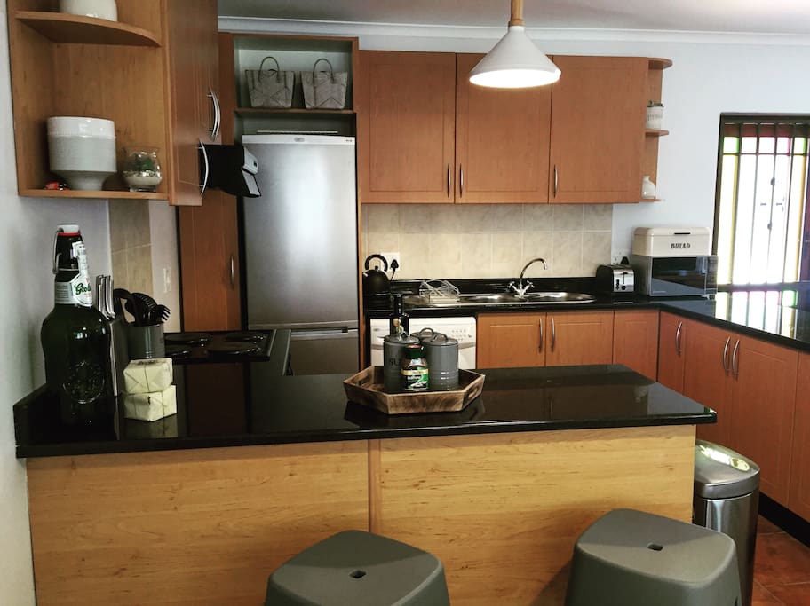 Kitchen - fully fitted for cooking or takeaways, plus super cool breakfast bar stools