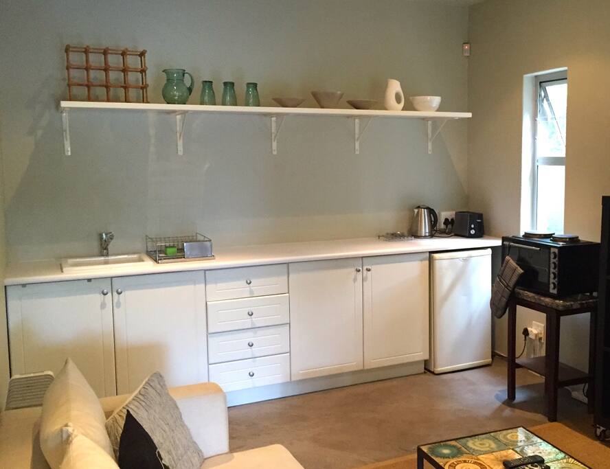 Well equipped kitchenette, bar fridge, mini stove and oven