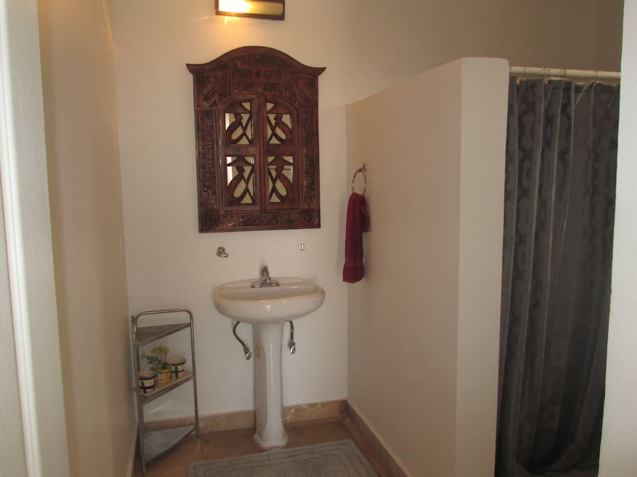 This is the private bathroom with shower in your room.