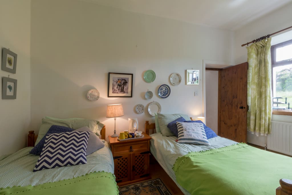 Double bedroom, with view towards the garden.
