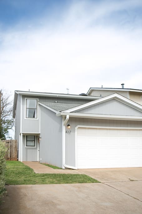 Two story home with attached garage.