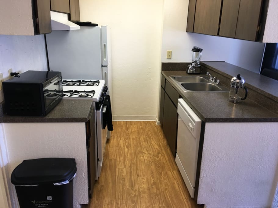 Gas stove, dishwasher, microwave, french press.