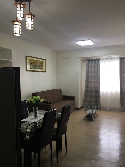 Wide living room with dining