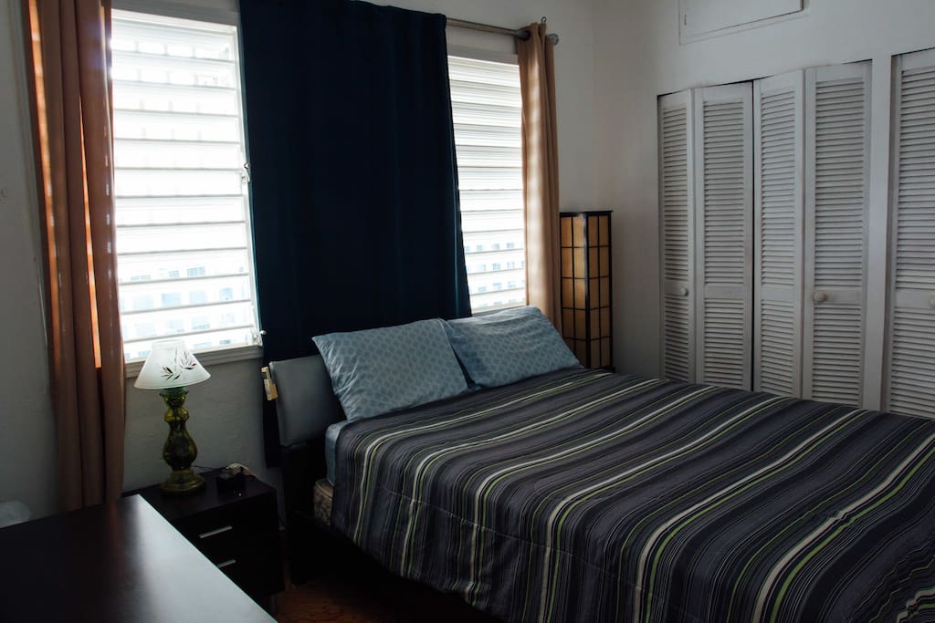 Comfortable queen bed with a resting mattress air conditioned inverter and blacklight curtains sleep and rest in your private room.
