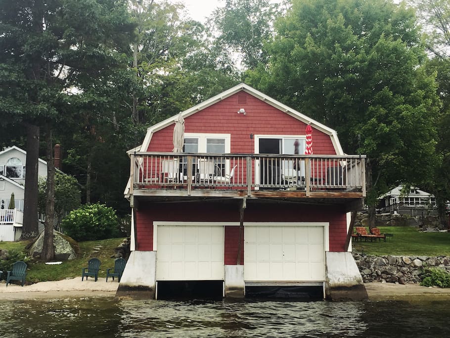 View from lake - private sandy beach on left side of house, stairs to water and small sandy area on right side