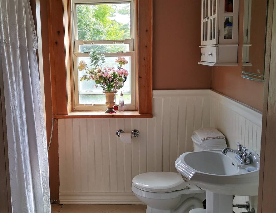 The shared bathroom was a child's bedroom back in the day. We have upgraded from the outhouse (still on the property), but it is still a work in progress :)