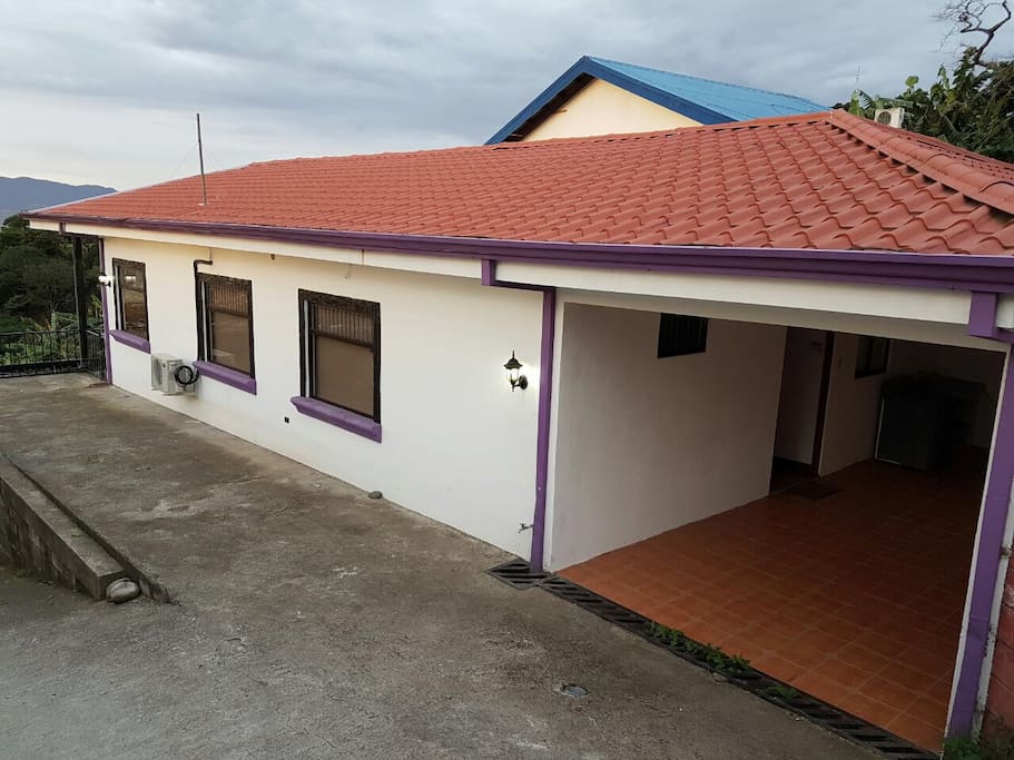 Back entrance garage and parkings of the apartment.