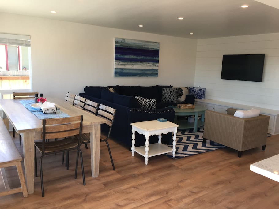 Dining and Living Room. Dining table seats 10 plus 2 kids with the bench.
