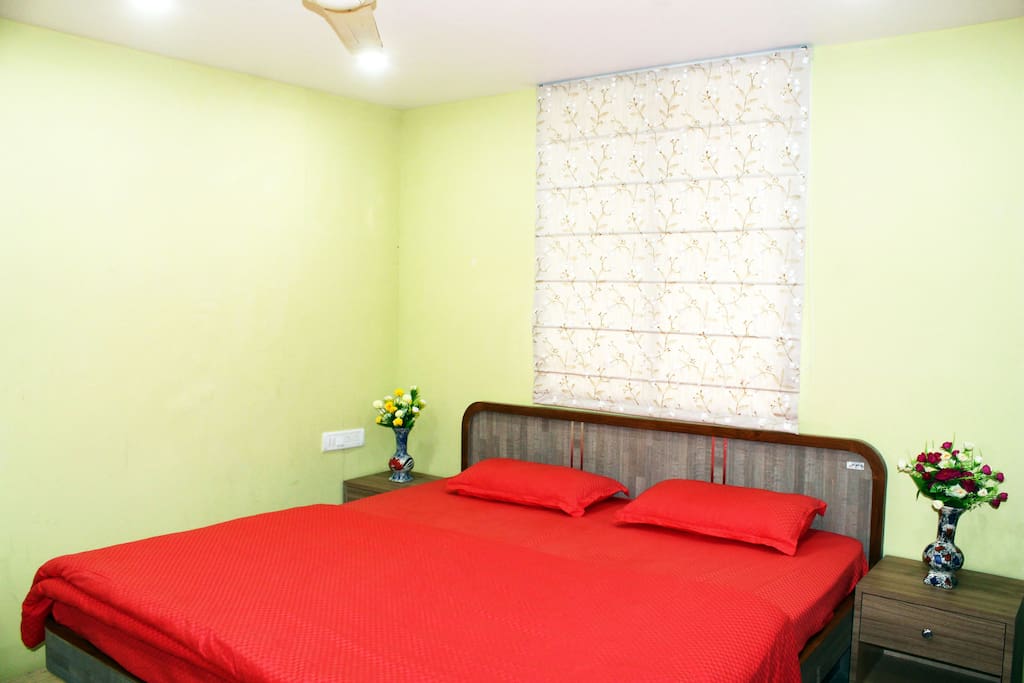 Room consists of King size Bed, Comfortable Mattress, Quality Bedsheet, Pillows & Comforter along with Dressing cum Work Table, Chairs, Centre & Side Tables, Window Curtains and other amenities.