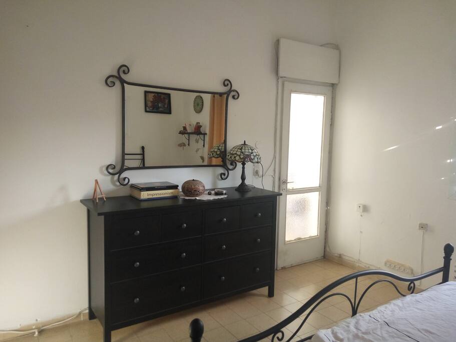 Bedroom - two windows with adjacent balcony