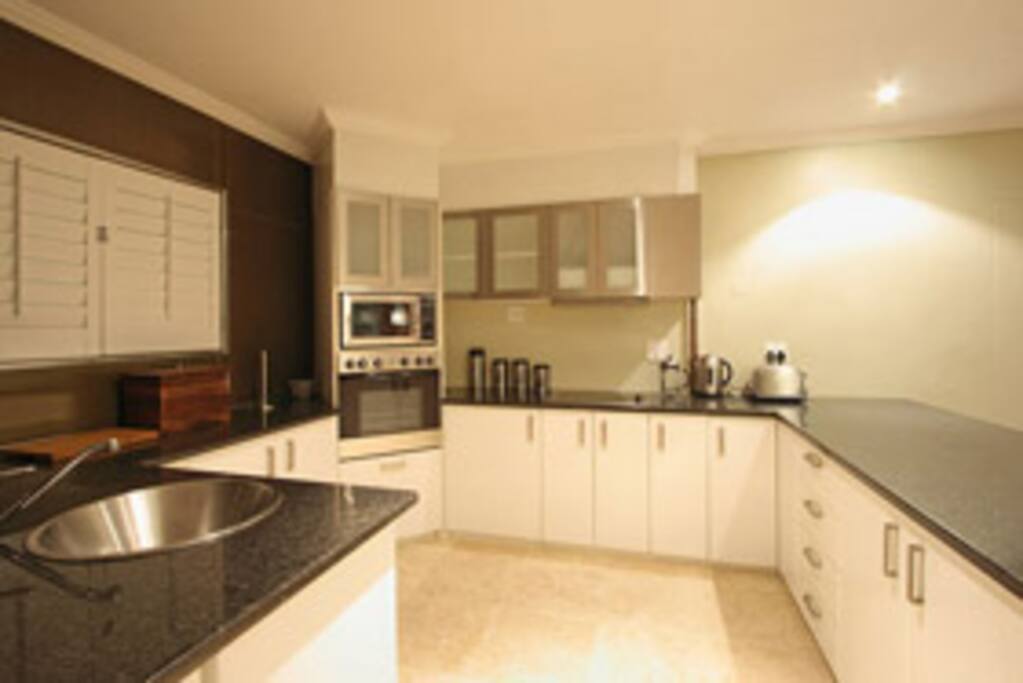 Open Plan Kitchen Looking onto Living Area - Sea Views