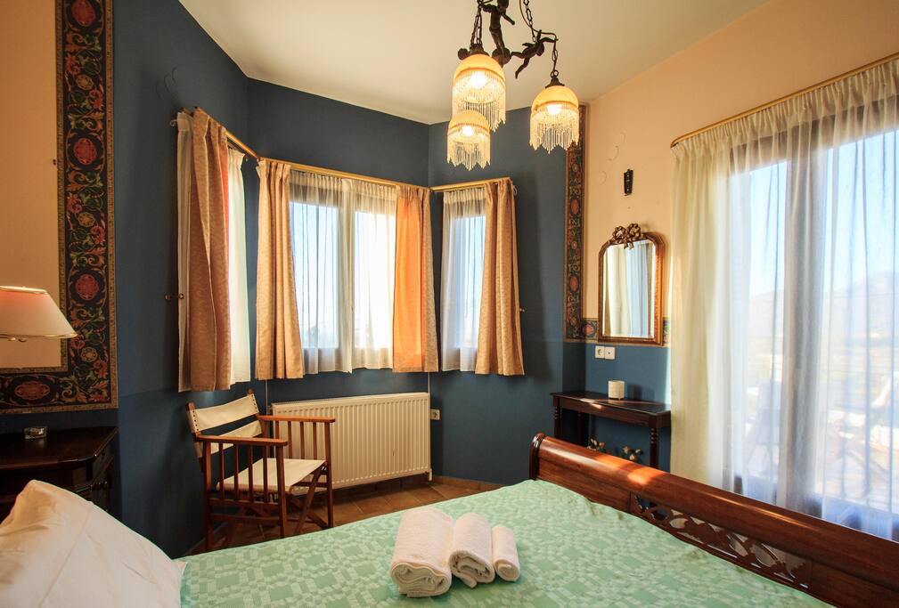 Master bedroom with a large queen sized italian custom made bed