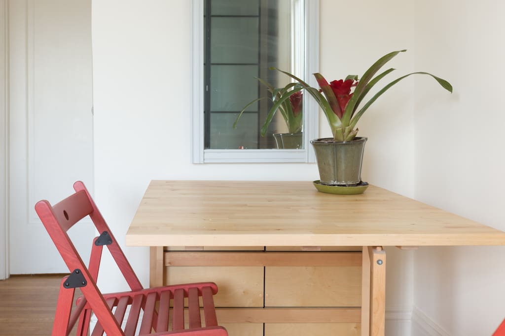 Expandable table gives you a workspace and bright spot for a meal