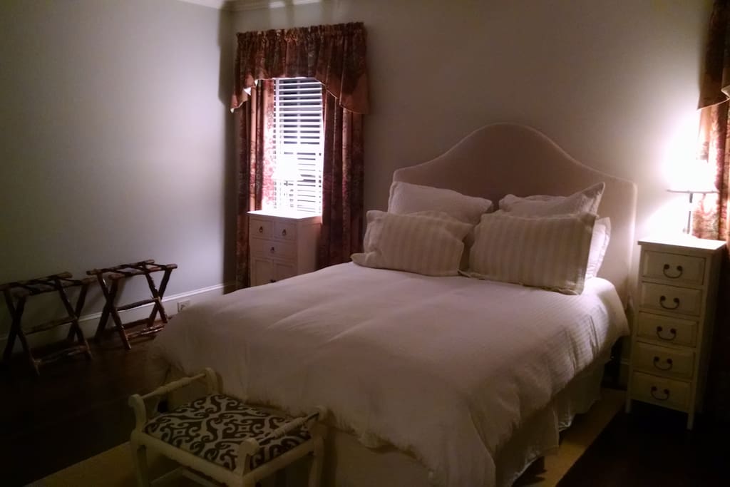 Queen size bed, plenty of storage and three windows