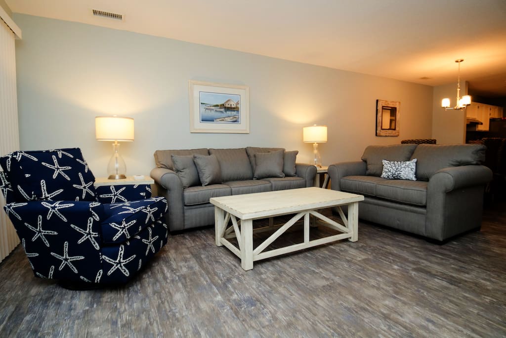 The living area is very inviting and comfortable, the sofa is a sleeper sofa.