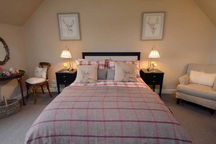 Master bedroom with hairdryer and dressing table...