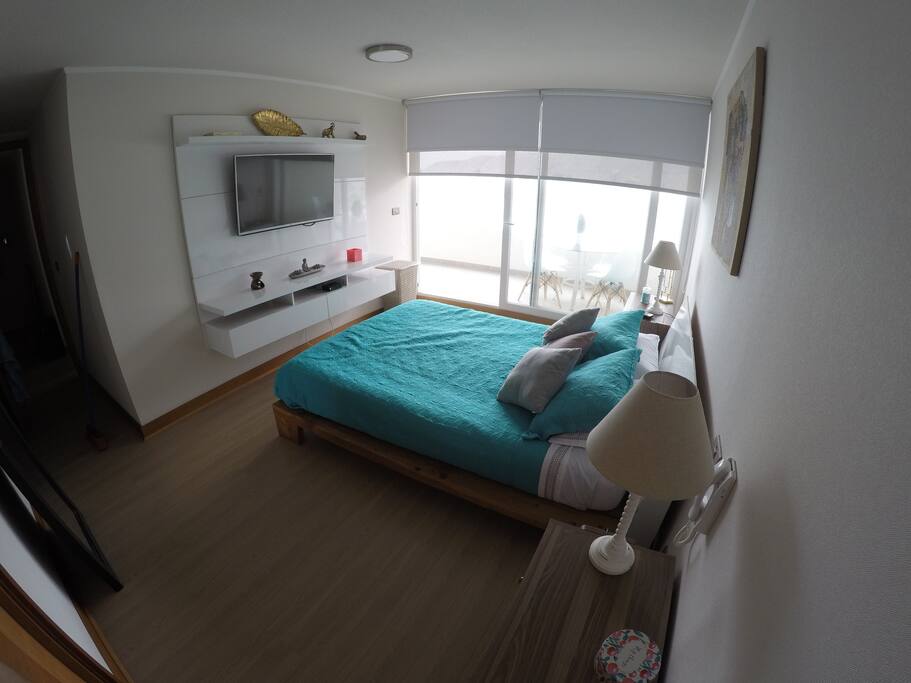 Habitación 1, Smart TV, Wifi, cama de 2 plazas, con terraza vista a playa Cavancha.