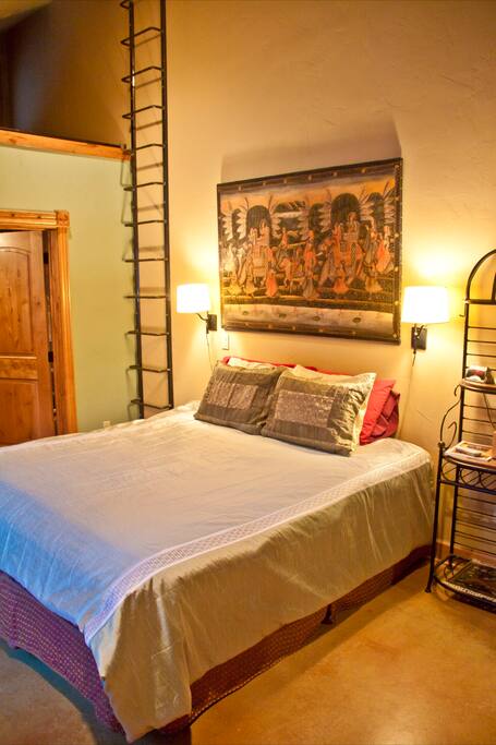 King bed with Indian tapestry