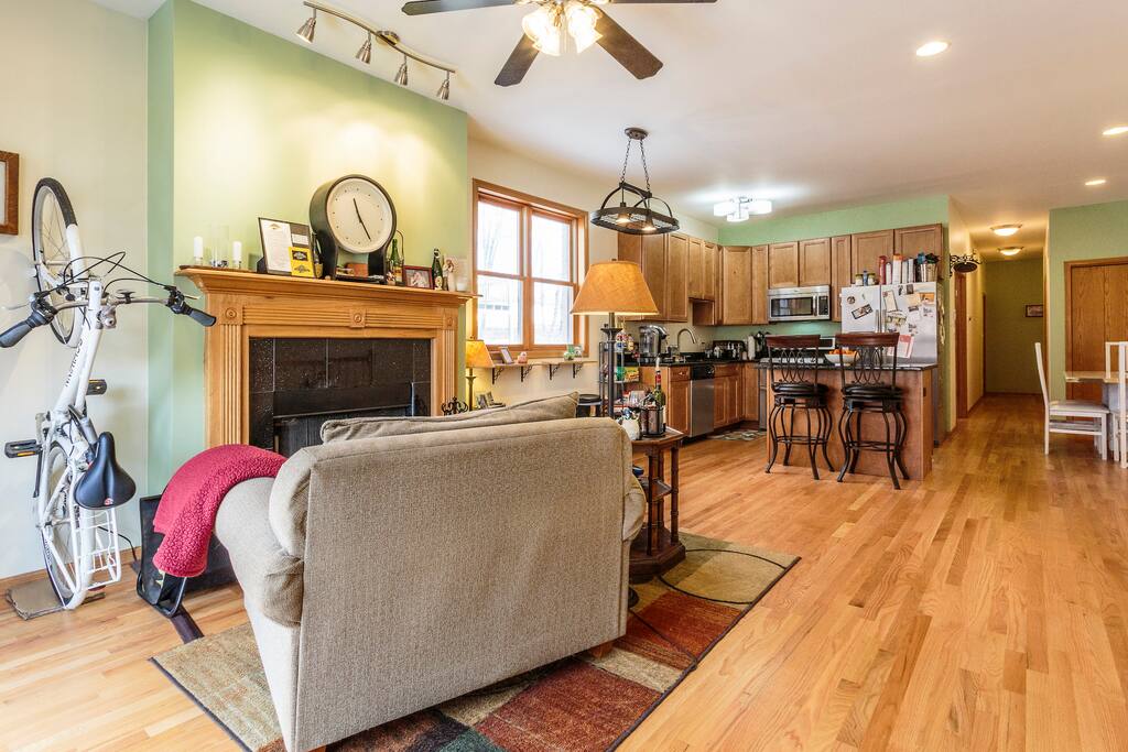 A cozy, overstuffed reading chair and living area greets you as you walk through the front door.