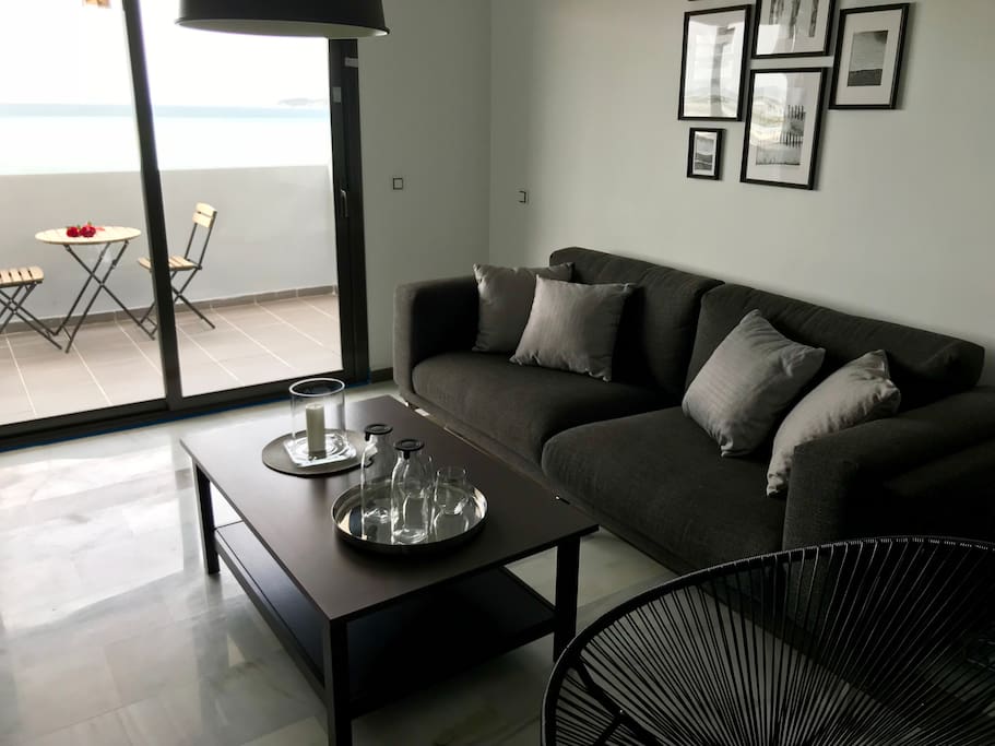 The living room has direct access to the balcony.