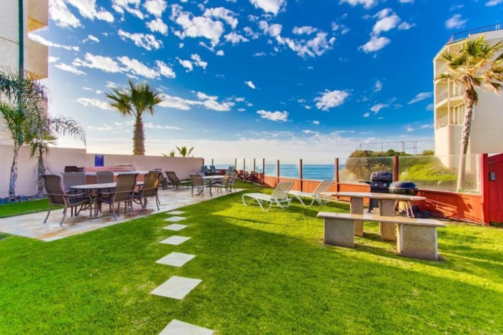 Large Shared Patio with Ocean Views and Hot Tub and Barbecue.