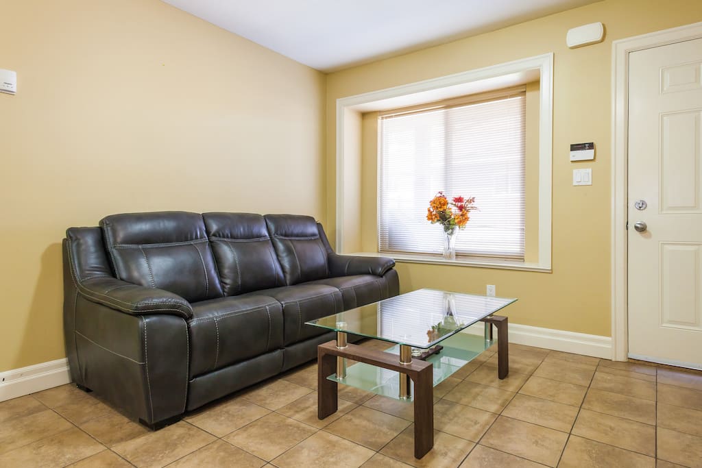 At entrance, kitchen with sitting area, including nice coffee table