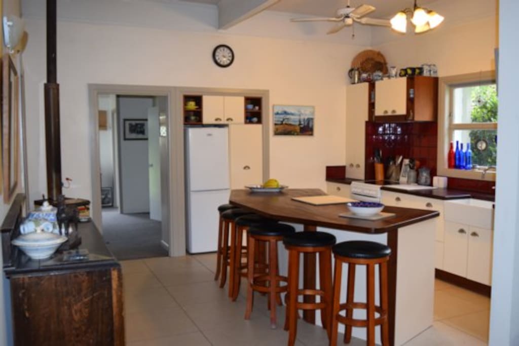 Open kitchen and breakfast bar fully equipped for cooking