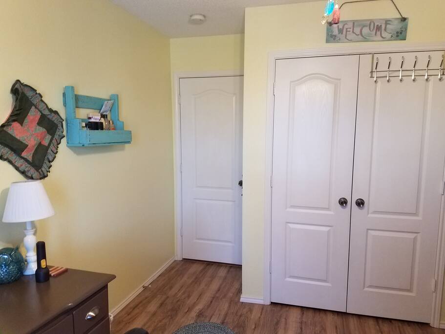 clean, wood floors, dresser and desk, closet for guests,