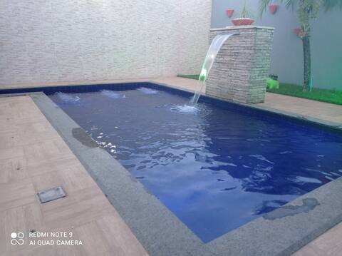 House with solar heating pool.