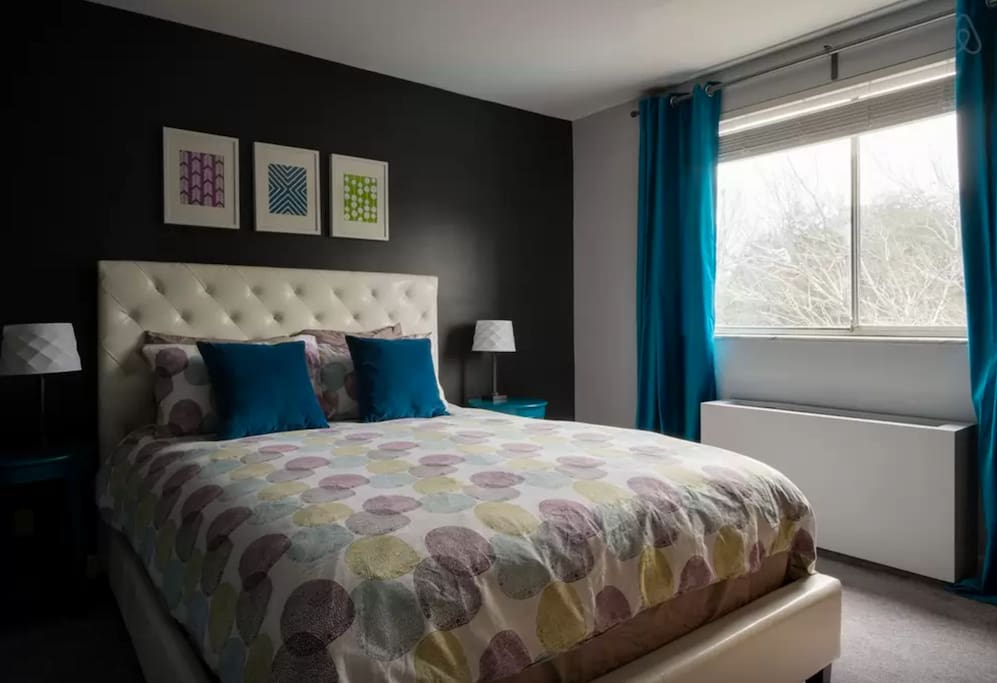 Newly redesigned bedroom with queen pillow top mattress and high quality bedding.