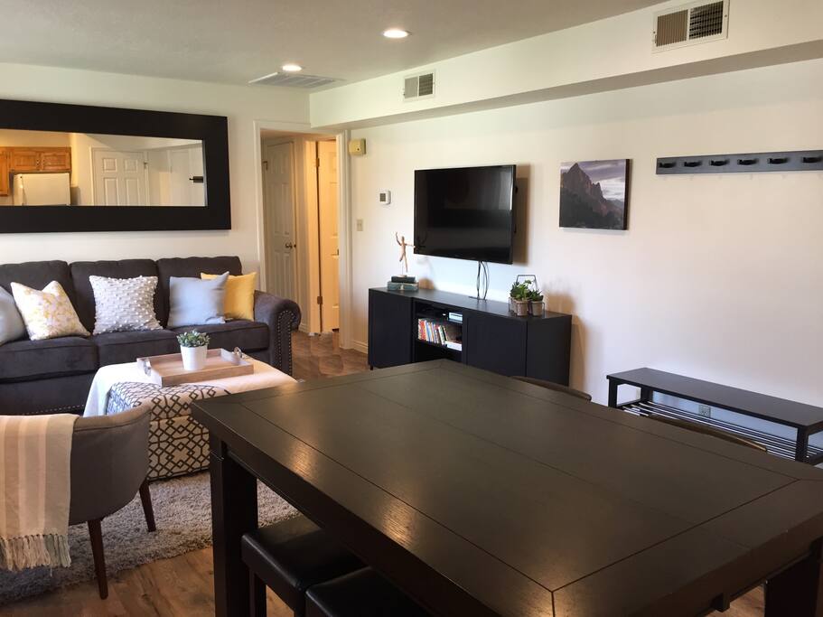 Main area Cable TV, Apple TV, DVD/Blueray player, Wii, Children's books and toys, Family games. A door separates each sleeping area, including the living room from the bathroom for added privacy.