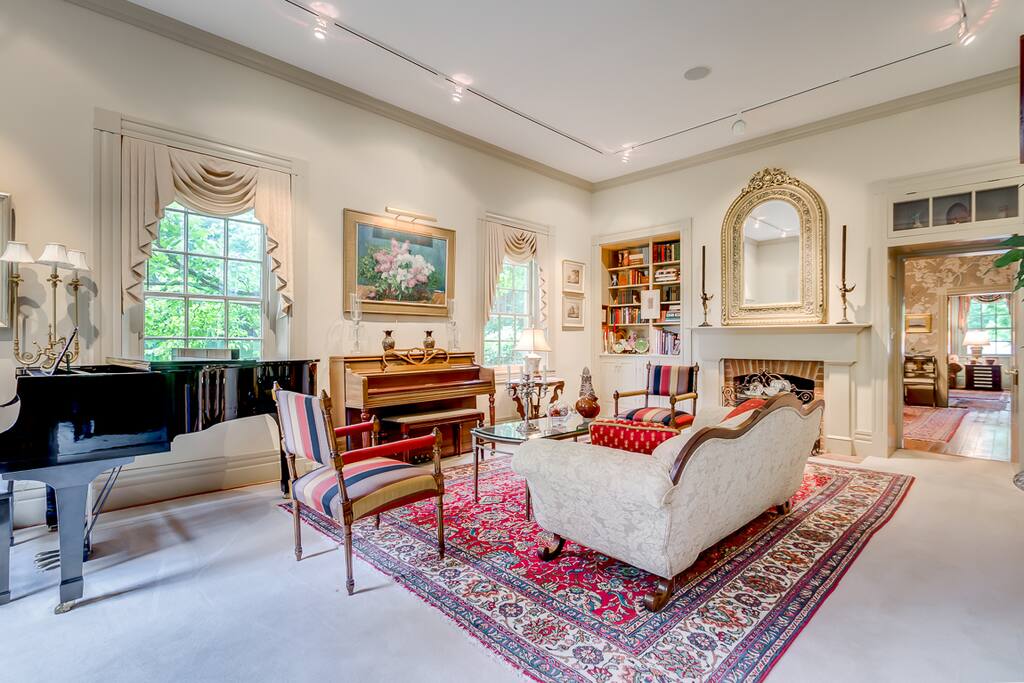 Living room with Piano and Writing Desk