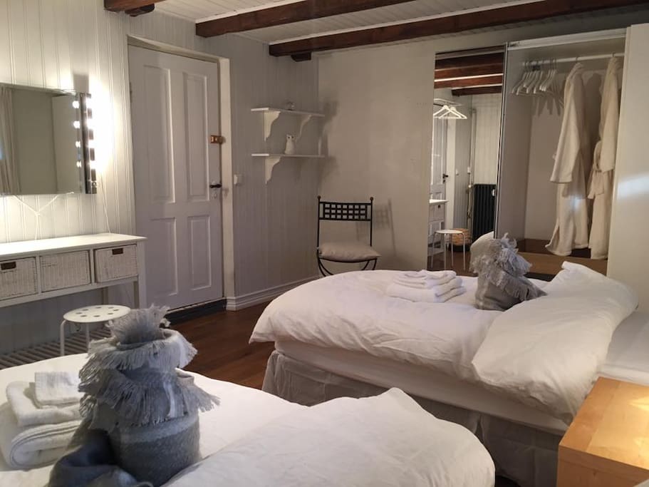 Two comfy beds, bathrobes, small vanity, big closet.