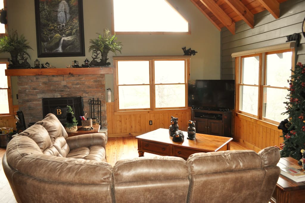 Main level living room with wood burning fireplace