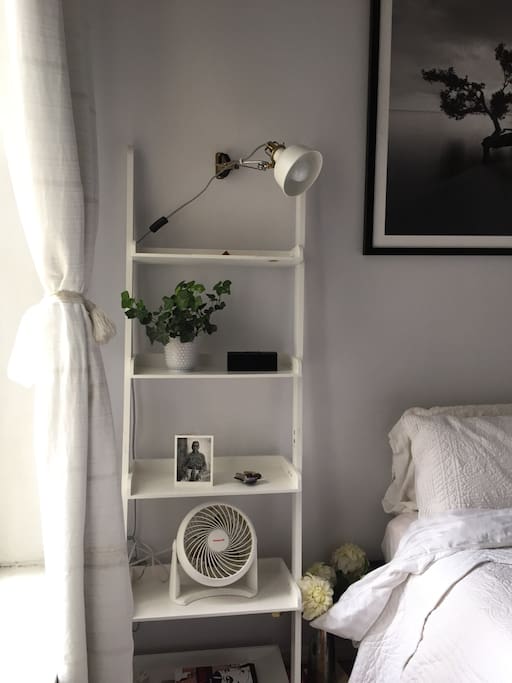 Full charging station and reading lamp with dimmer featured bedside for your comfort.