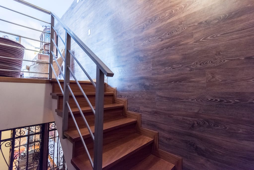 Wooden stairs to your apartment.