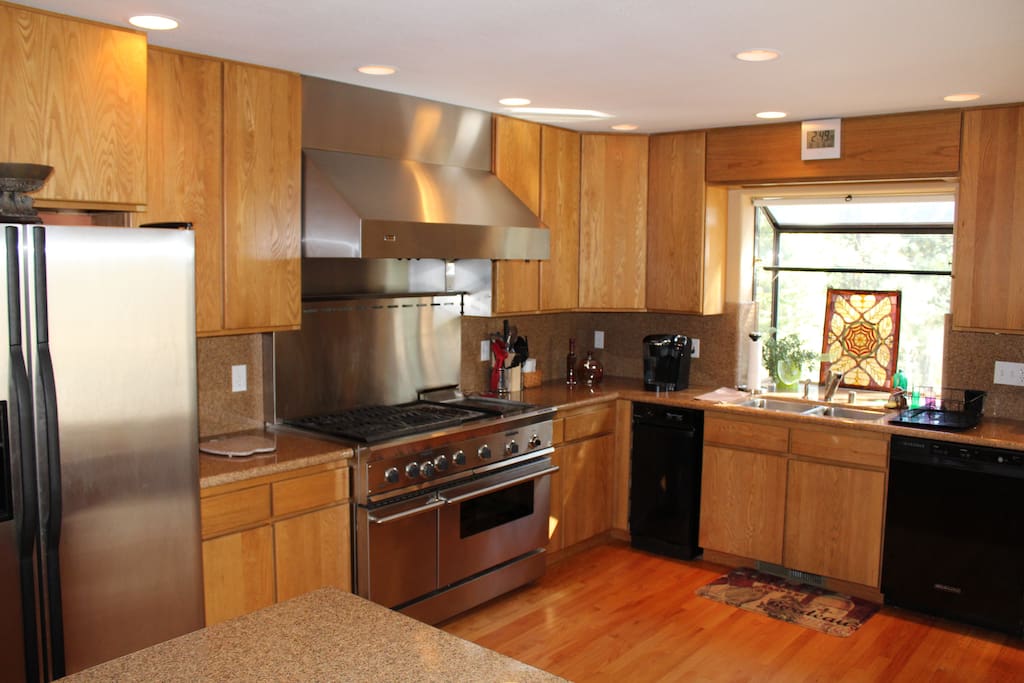 Well-appointed kitchen with a Viking commercial stove