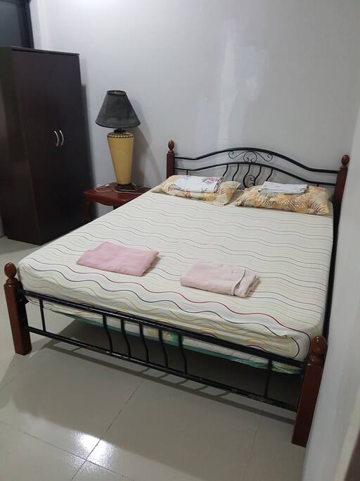 Queen-sized bed arrangement